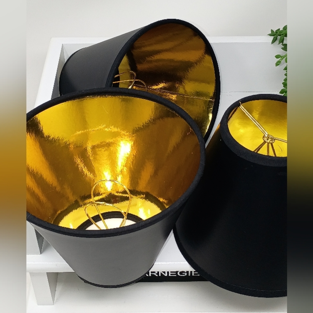 Sleek Black and Gold Decor Accents with Cylindrical Design